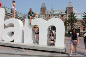 Chilling on the 'm' of Amsterdam, one of our last stops. Love that we got a pic of all of us!